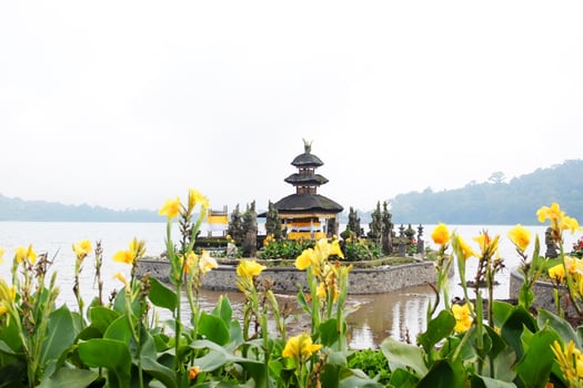 Pura Ulun Danu Bratan temple is landmark of Bali for use in Buddhist and Hindu religious ceremony located in lake and mountain on Bali island of Indonesia. Travel destination for culture of Asian photo