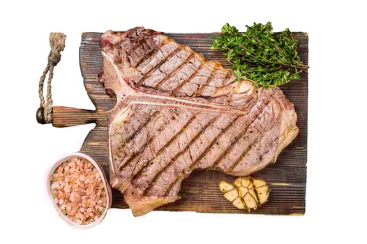 BBQ Roast T bone or Porterhouse beef meat Steak on a wooden board with spices. Isolated, white background. photo