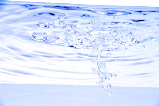 Blue water with air bubles photo