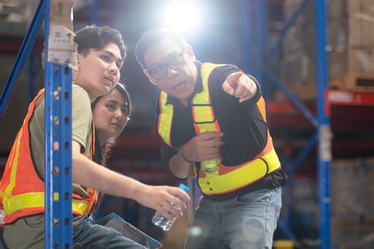 Group of warehouse employee rest comfortably during work photo