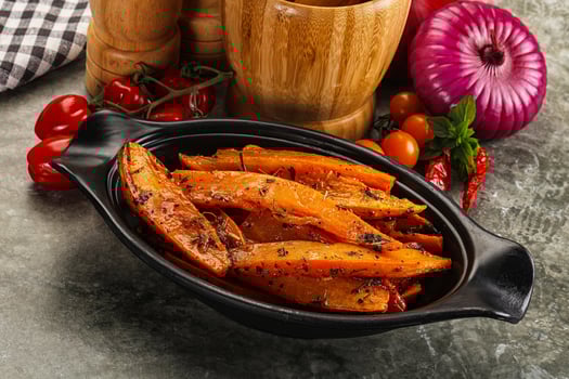 Baked batat with with spices photo