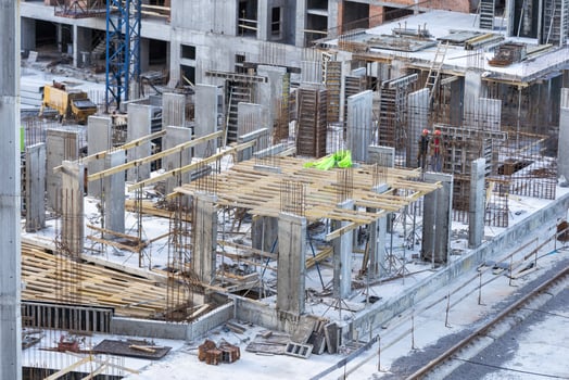 Construction workers working on Construction machine. Aerial platform for workers who work at height on buildings. photo