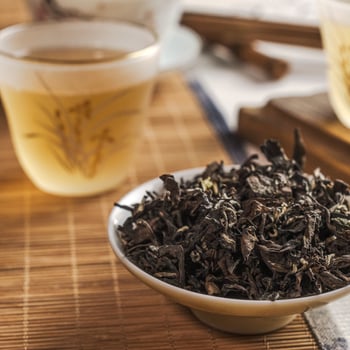 Experience an Authentic Tea Ceremony featuring Brewed Leaves served in a lovely Cup photo
