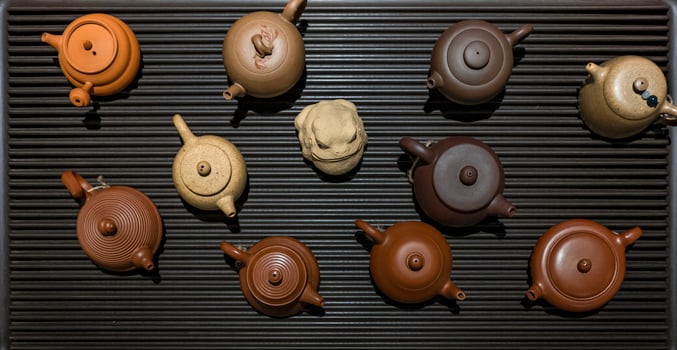 A Beautiful Collection of Assorted Teapots Available in Various EyeCatching Shades and Styles photo