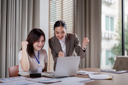 Exciting business achievement celebration modern office digital engagement bright atmosphere joyful perspective success concept photo