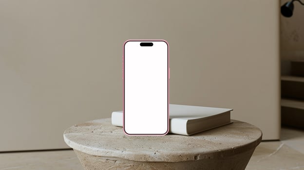 Pink smartphone mockup template with blank screen on marble table photo