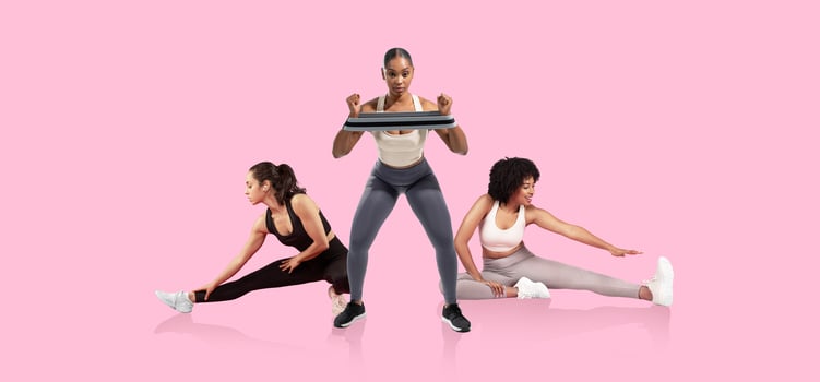 Three women participate in a fitness session on a pink backdrop, showcasing different exercises. One woman lifts a weight while the others stretch, promoting an active lifestyle. photo