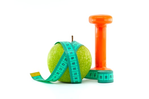 Healthy Living Concept With Apple and Dumbbell Isolated on White photo