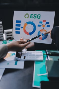 Carbon offset price report CO2 emission. Future growth Net zero waste in ESG ethical SME office protect climate change global warming social issues project. Group of asia people Eco friendly SDGs plan photo