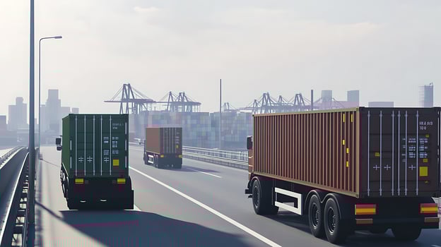 Container Trucks Passing Busy Industrial Ports Under Blue Skies photo