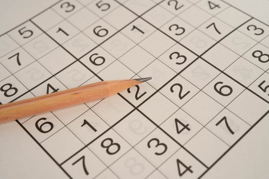 Sudoku puzzle, game to play for keep you brain younger for developing Alzheimer disease in senior patient. photo