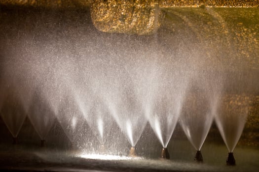 Fountain details at night photo