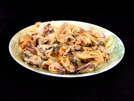 Seafood dishes on white plates photo
