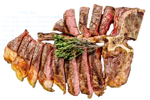Sliced Grilled Florentine steak. T bone meat beef. Isolated on white background. Top view. photo