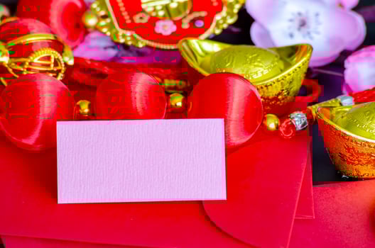 Chinese New Year decoration with customizable space on notepad for text or wishes. Chinese New Year celebration concept photo