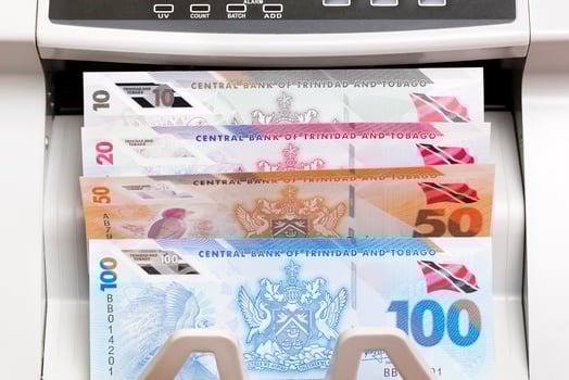 Trinidad and Tobago dollar in the counting machine photo