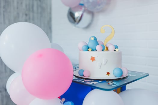 Sweet gender patty cake. Cake with blue and pink balls for a party. photo