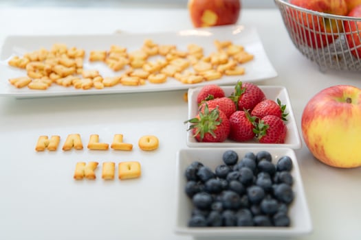Snacks and fruits on the table that the mother prepared for the little daughters to eat as a snack photo