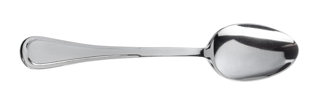 Silver spoon cutlery isolated on white background photo