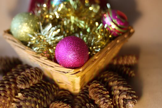 Decorative christmas balls and fir-tree cones close up. photo