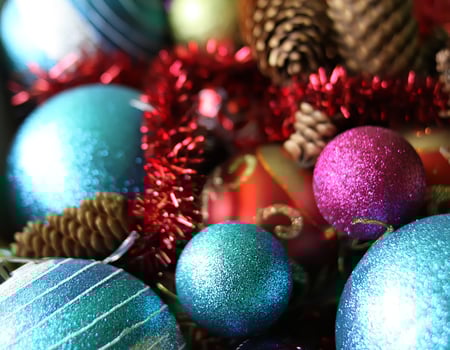 Decorative christmas balls and fir-tree cones close up. photo