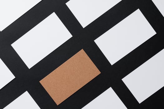 White blank business cards on dark black background photo