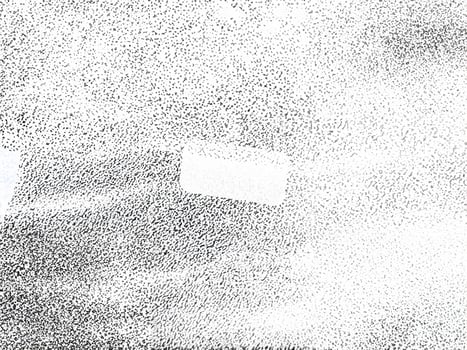High-contrast black-and-white abstract texture with a grainy noise effect, ideal for overlays or creative backgrounds. photo