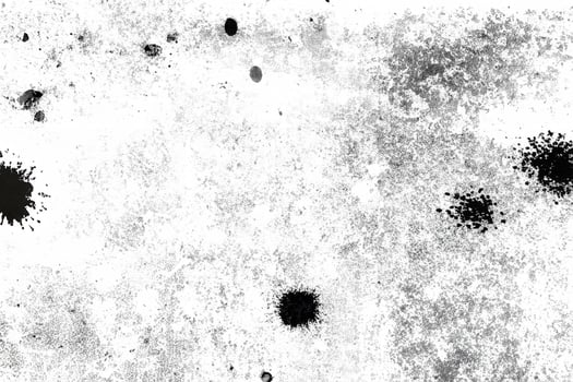 Abstract distressed texture with black speckles and rough patches on a white background, ideal for overlays or backgrounds. photo