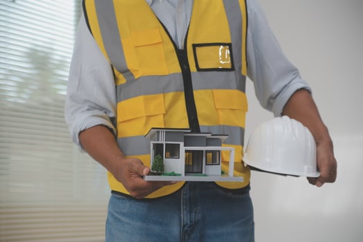 Image of engineer meeting for architectural project. working with partner and engineering tools on workplace vintage tone. photo