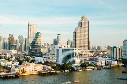 Bangkok, Thailand, 2024 - View of Beautiful blue sky over Large Metropolitan City. Bangkok city skyscrapers after sunset with sky background before Sunset, Space for text. photo