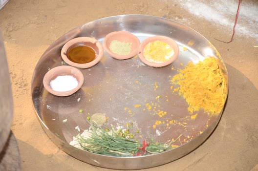 A metal tray with a variety of ingredients on it photo