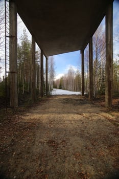 View under abandoned platform of old railway structure in Sweden photo