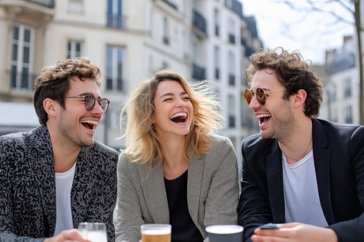 Joyful gathering of friends enjoying conversation and laughter in a Parisian cafe setting photo