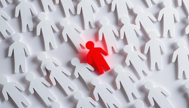 A glowing red figure surrounded by white figures, Individuality concept, Think different, Creative idea, CEO, Leadership photo