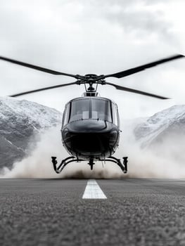 helicopter landing on snowy mountain runway photo