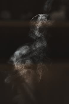 Ethereal Smoke Formation Captured Beautifully in Soft and Enveloping Light Atmosphere photo