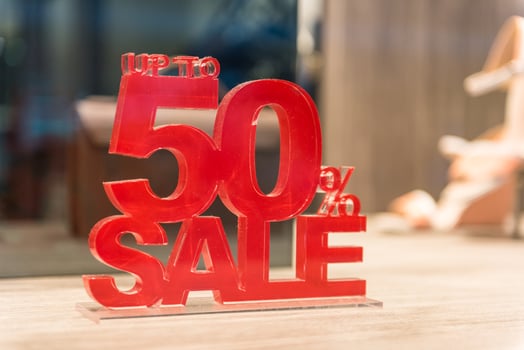 Sale signs in shop window photo