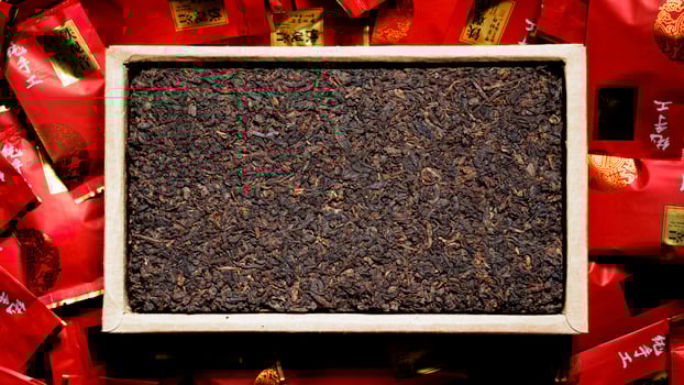 Experience HighQuality Loose Leaf Tea Presented Beautifully on a Wooden Tray for Enjoyment photo