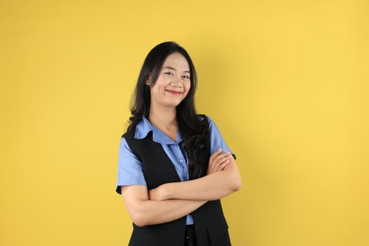 Asian Young Women Standing Confident with Arms Crossed, Smiling Pleased photo