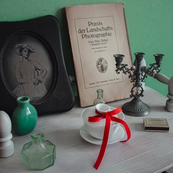 An exquisite vintage still life arrangement featuring an array of charming retro elements photo