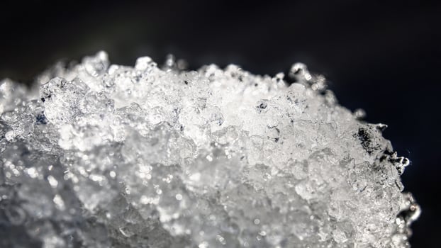 Close up of ice crystals in thawing snow photo