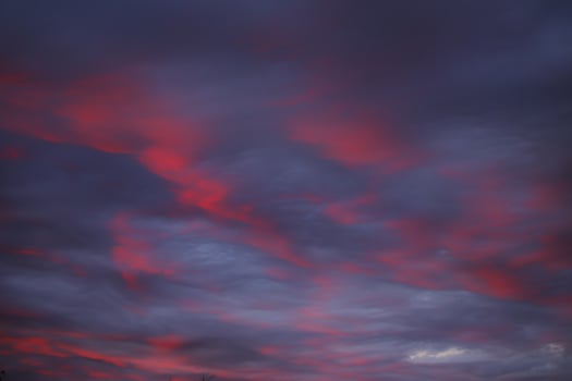Impressive cloudscape, illuminated by the sun below photo