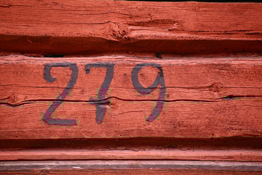 Close up of house number in church town Bonnstan in Skelleftea photo