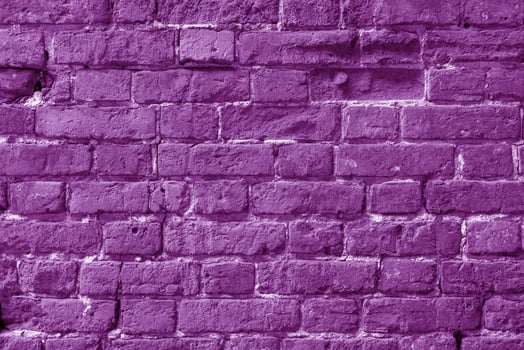 Pink brick building wall. Interior of a modern loft. Background for design and interview recording. photo