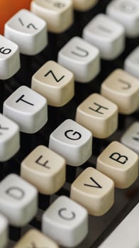 Closeup of vintage typewriter keys, highlighting their design and historical significance photo