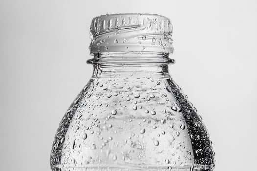 Close-up of a Water Bottle Covered in Condensation photo