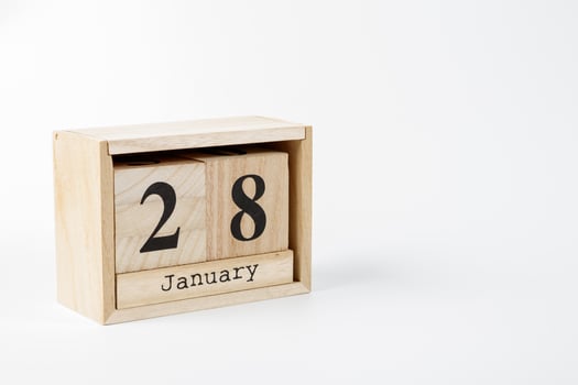 Wooden calendar January 28 on a white background photo