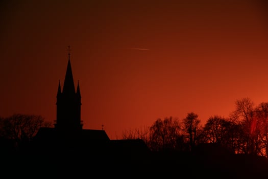 Silhouette of German church in Magdeburg, in dusk photo
