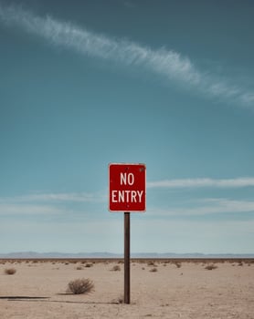 No Entry Sign in Desert Landscape Blue Sky photo