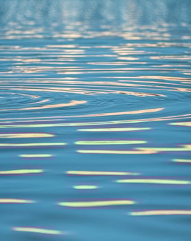 Bright Blue Water with Dynamic Light Reflections photo